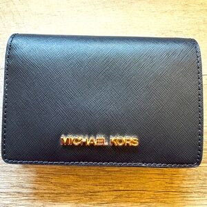 MICHAEL KORS black wallet with snap closure